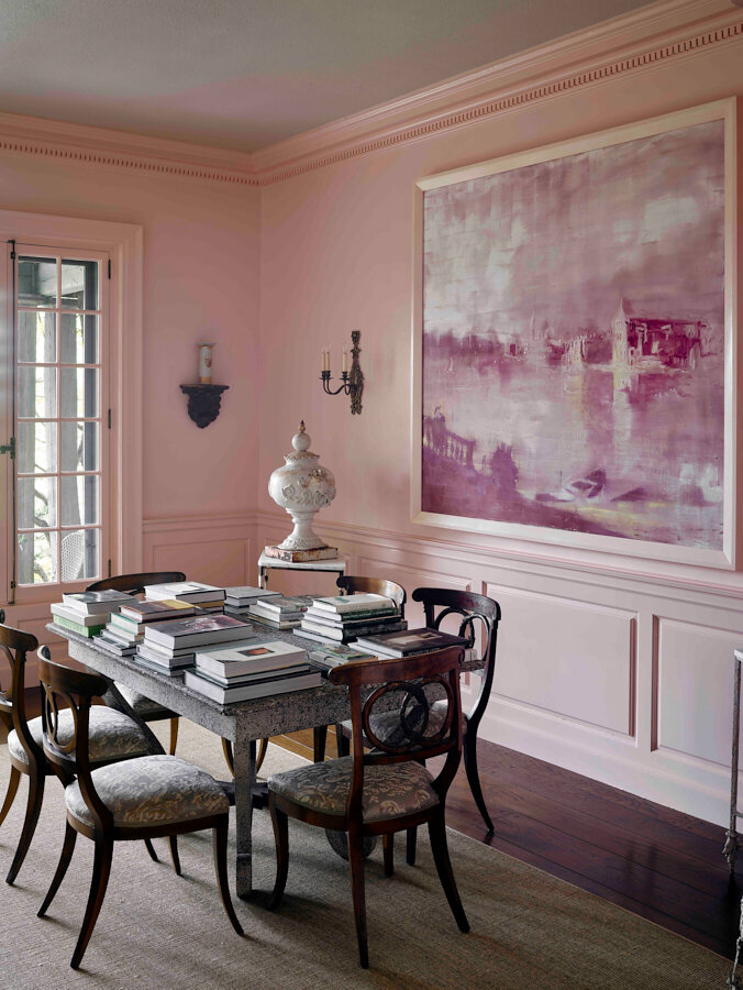 The blush pink dining room in the guest house. Painting by Kevin Burger. 