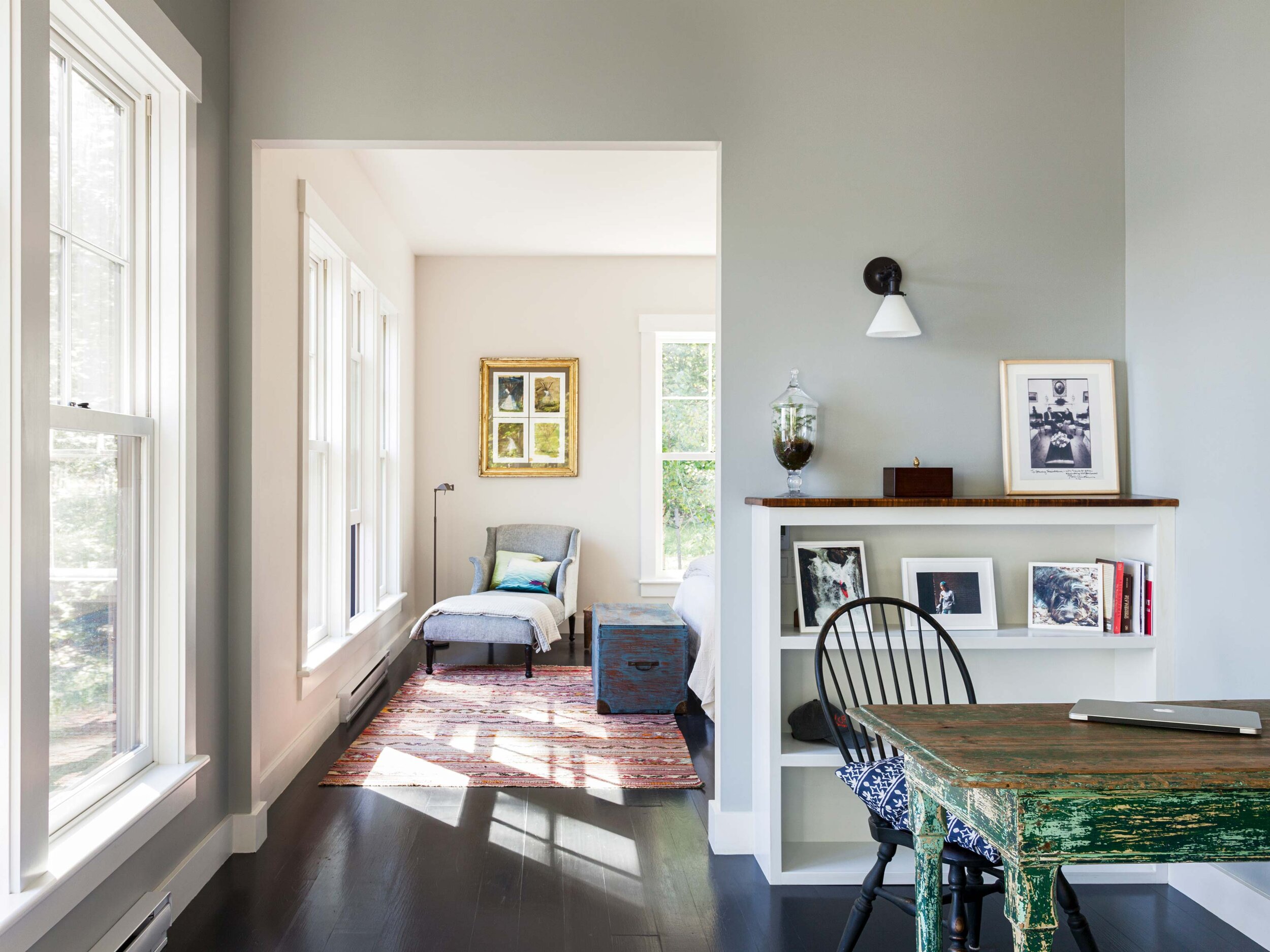  In an alcove off a hall, the light-filled home office has a chair from the Windsor Chair Company in Lincolnville. 