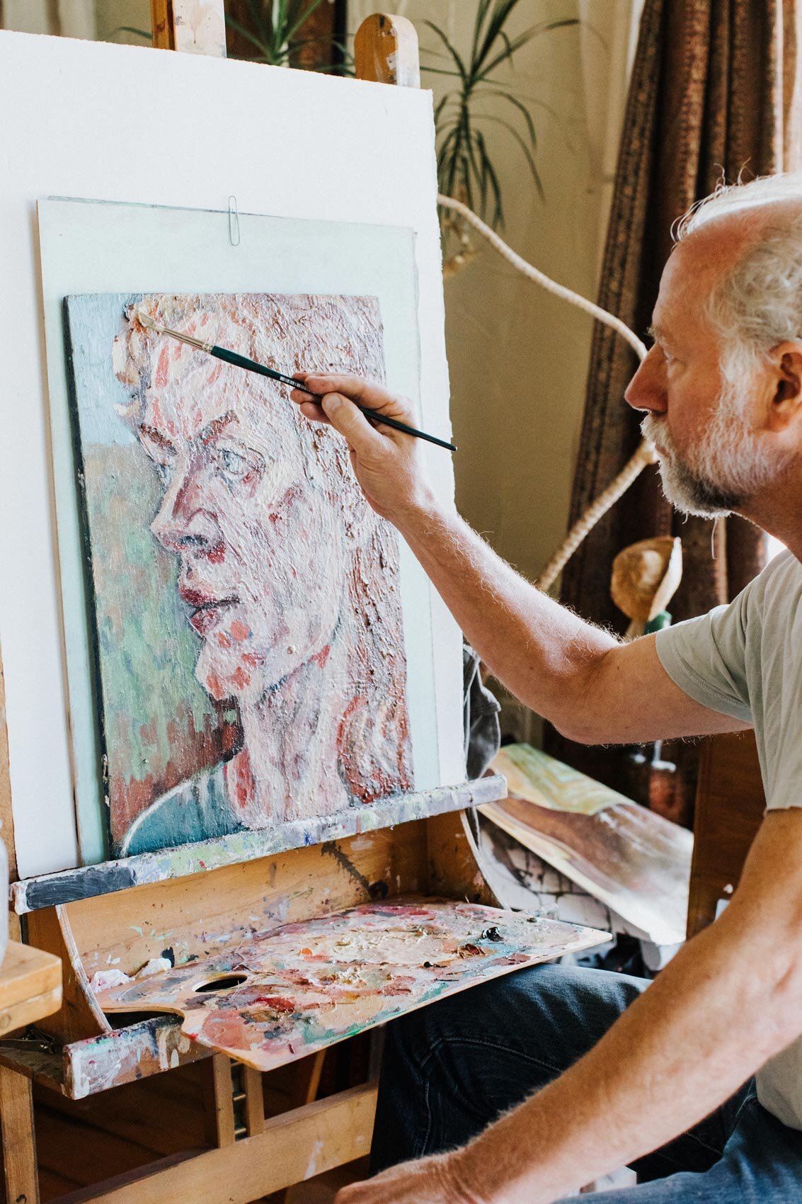  A portrait to be used in an upcoming film. Xander’s work has been featured in exhibits and galleries across the U.S. and abroad. Here, he works on a portrait to be used in an upcoming film. 